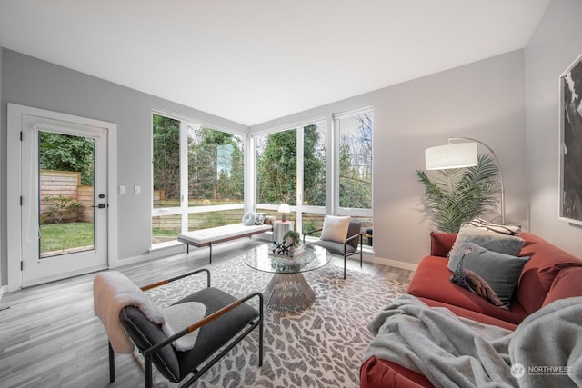 sunroom / solarium featuring a wealth of natural light