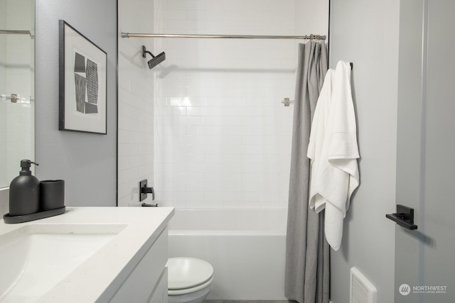 full bathroom featuring vanity, toilet, and shower / bath combo with shower curtain