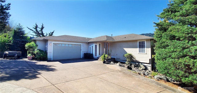 single story home featuring a garage