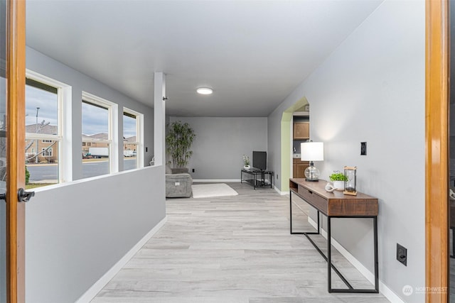 hall featuring light hardwood / wood-style flooring