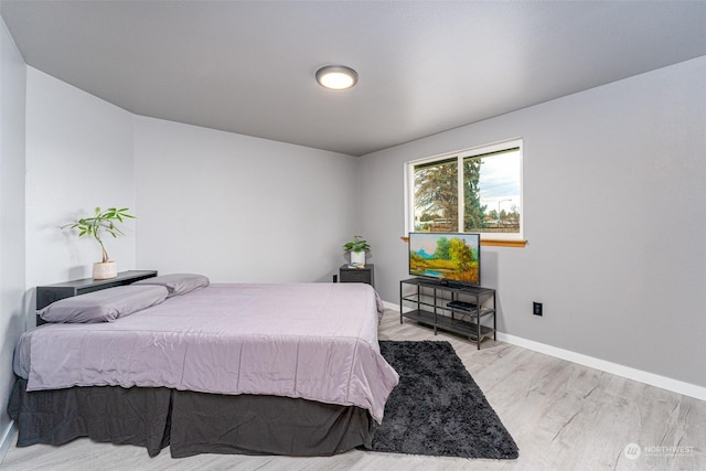 bedroom featuring light wood-type flooring