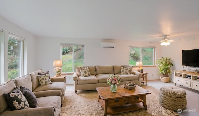 living room featuring a wall unit AC, ceiling fan, a healthy amount of sunlight, and light carpet