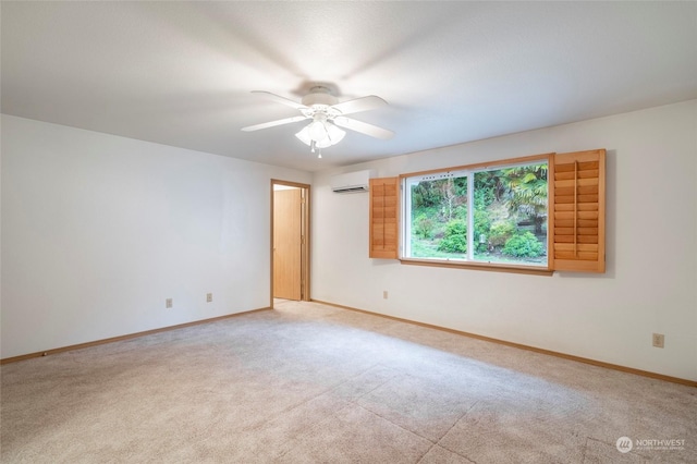 carpeted empty room with an AC wall unit and ceiling fan