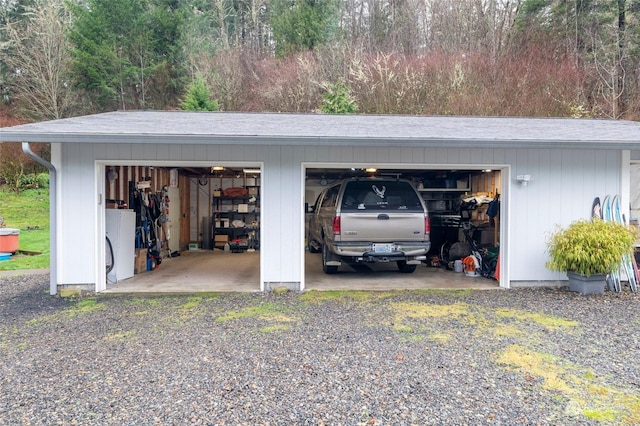 garage featuring washer / clothes dryer