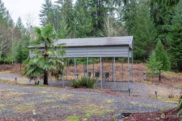 view of yard with a carport