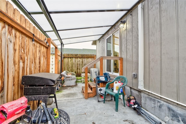 sunroom / solarium with lofted ceiling