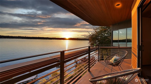 balcony at dusk with a water view