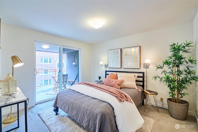 carpeted bedroom featuring access to outside