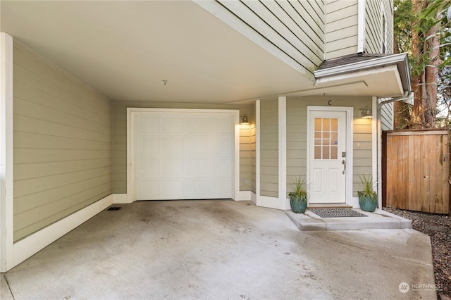 entrance to property featuring a garage