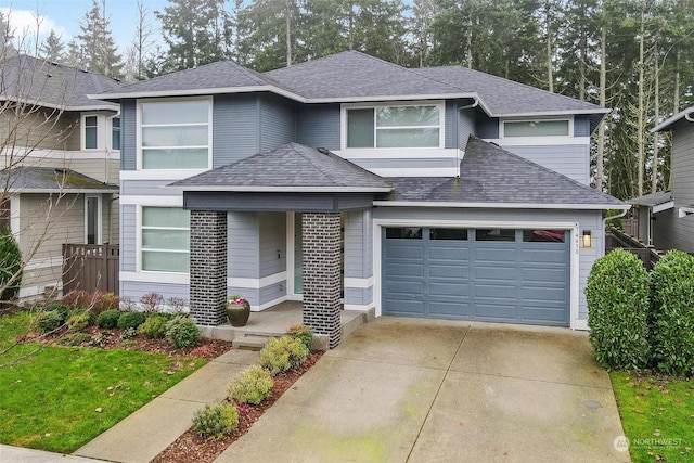 view of front of home with a garage