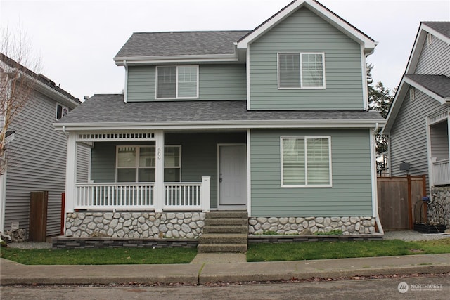 view of front of property featuring covered porch