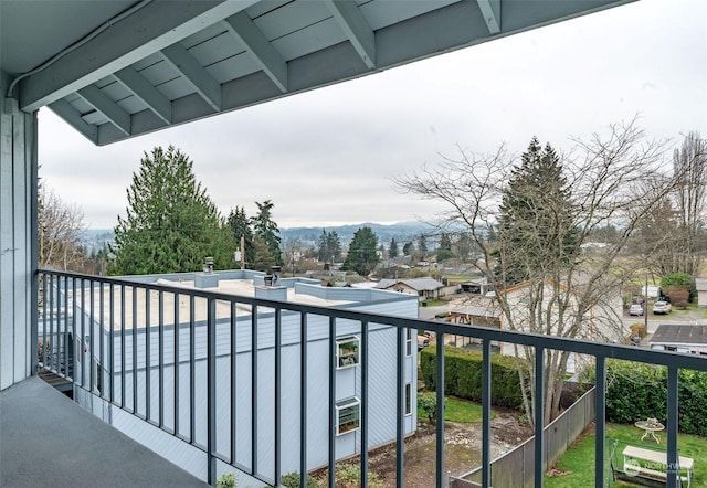 balcony featuring a mountain view