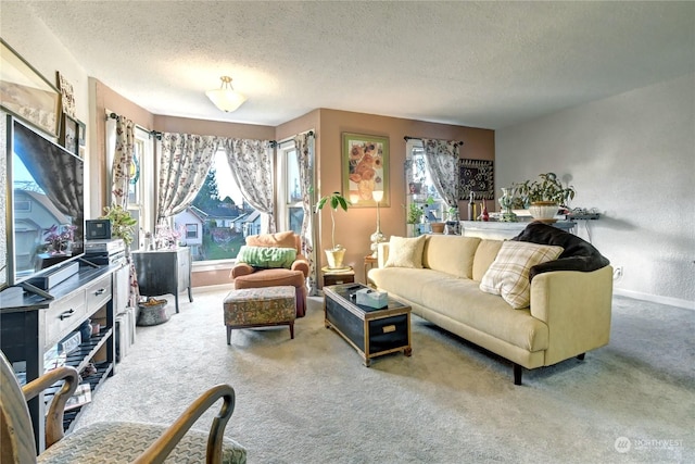 living room featuring a textured ceiling and carpet