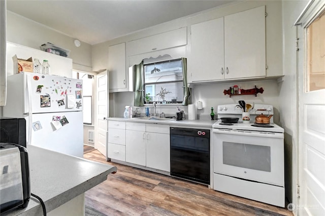 kitchen featuring black appliances, white cabinets, sink, and hardwood / wood-style flooring