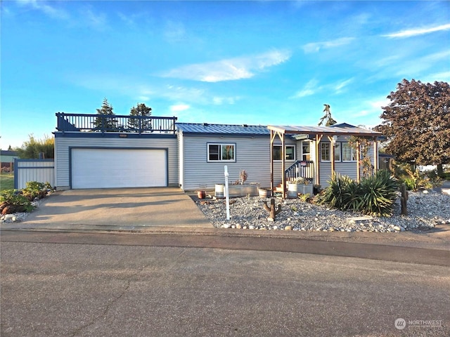 view of front of property with a garage