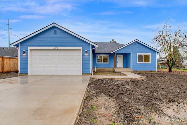 single story home featuring a garage