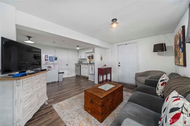 living room with dark hardwood / wood-style floors