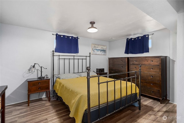 bedroom featuring hardwood / wood-style floors