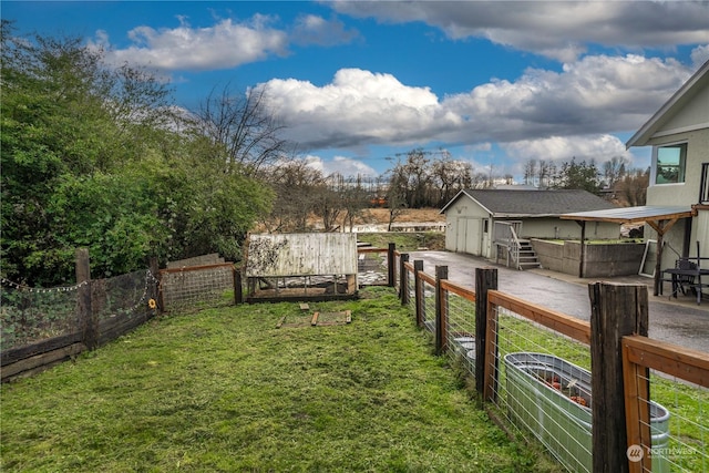 view of yard with a storage shed