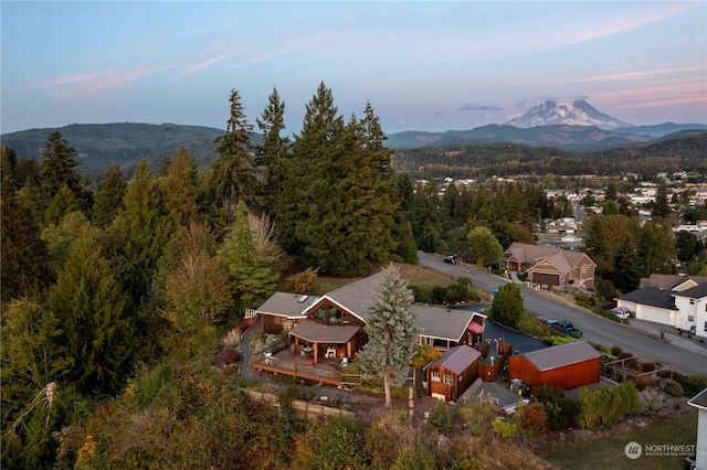 aerial view at dusk with a mountain view