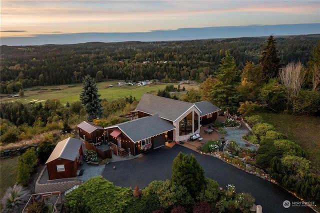 view of aerial view at dusk