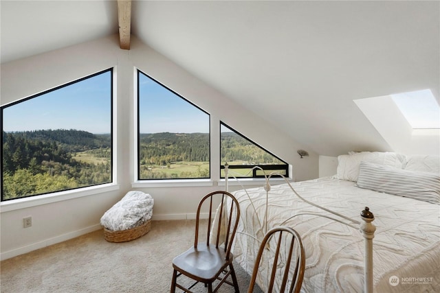 bedroom featuring carpet flooring and lofted ceiling with beams