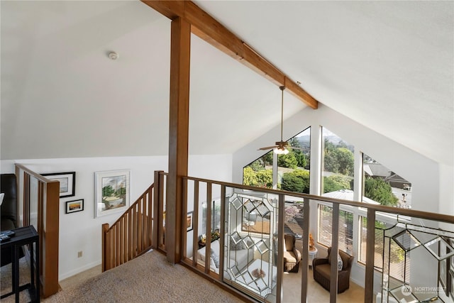 hallway featuring vaulted ceiling with beams and carpet floors