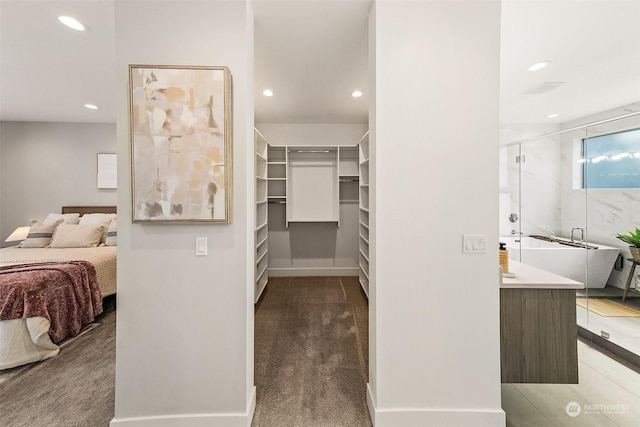 bathroom featuring vanity and a shower with shower door