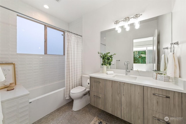 full bathroom featuring toilet, vanity, and shower / tub combo with curtain