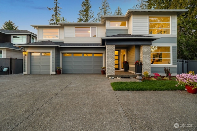 prairie-style house featuring a garage