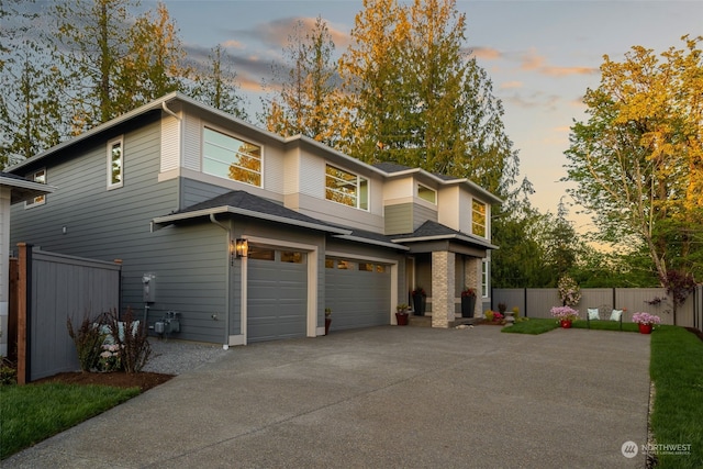 view of front of home with a garage