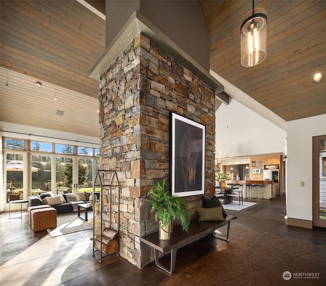 living room featuring high vaulted ceiling and wood ceiling