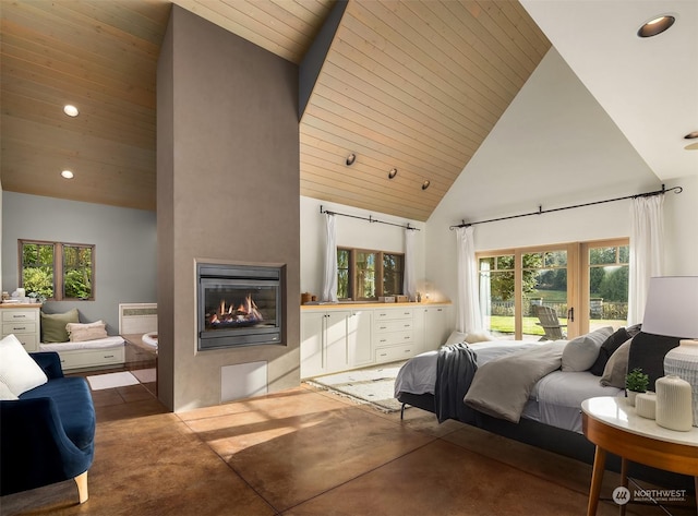 bedroom featuring wooden ceiling, high vaulted ceiling, and concrete flooring