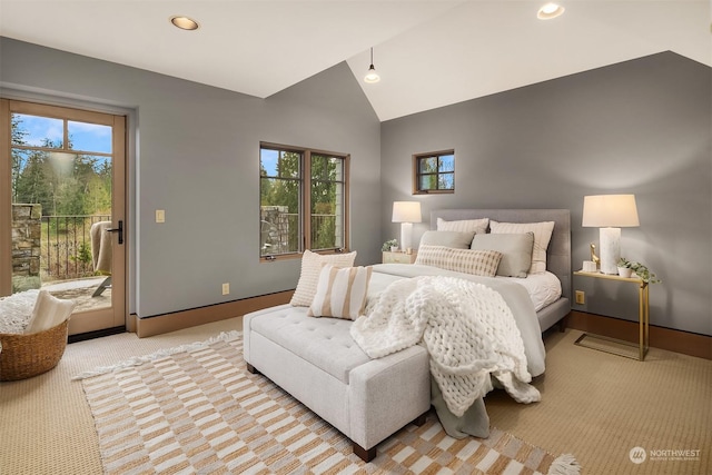 carpeted bedroom featuring vaulted ceiling