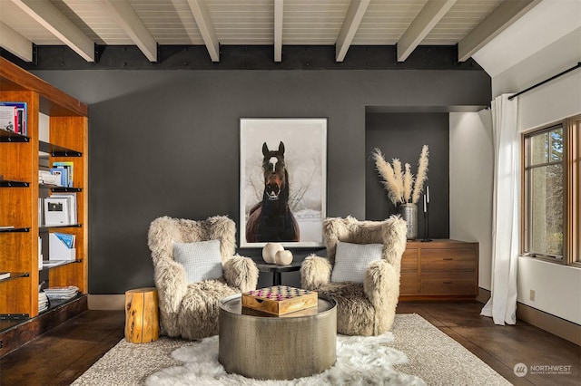 living area with lofted ceiling with beams