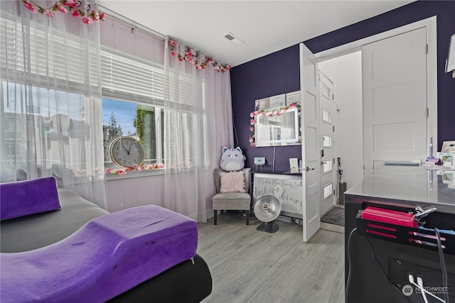 bedroom featuring light wood-type flooring