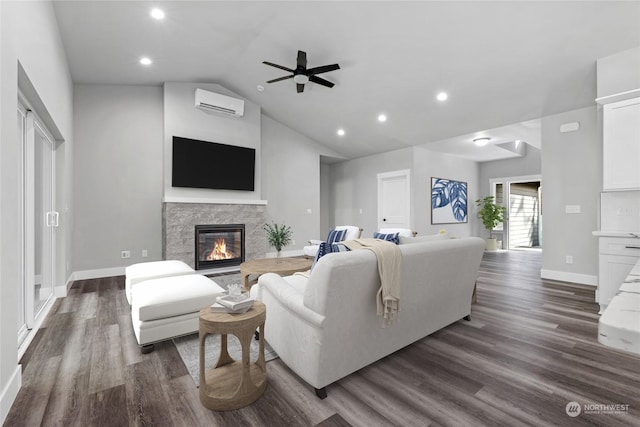 living room featuring dark hardwood / wood-style floors, ceiling fan, lofted ceiling, and a wall unit AC