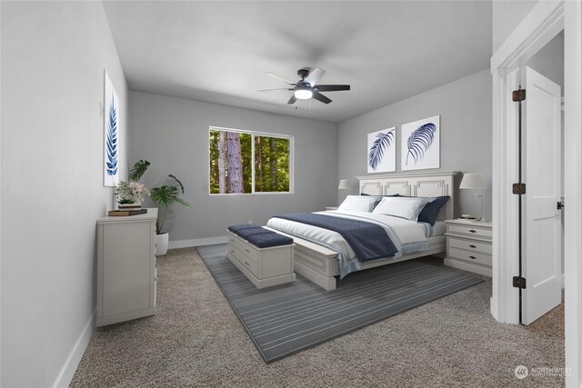 bedroom featuring ceiling fan and carpet