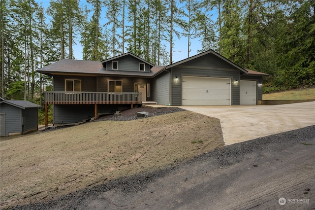 view of front of property featuring covered porch and a garage