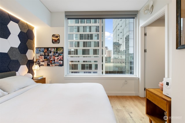 bedroom featuring light hardwood / wood-style floors