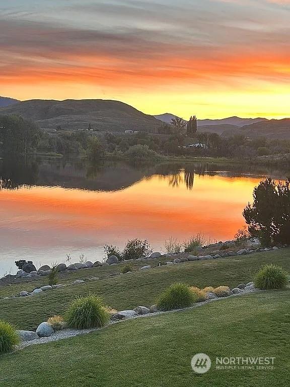 property view of water featuring a mountain view