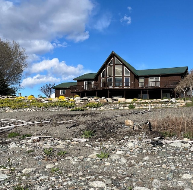 rear view of house with a deck
