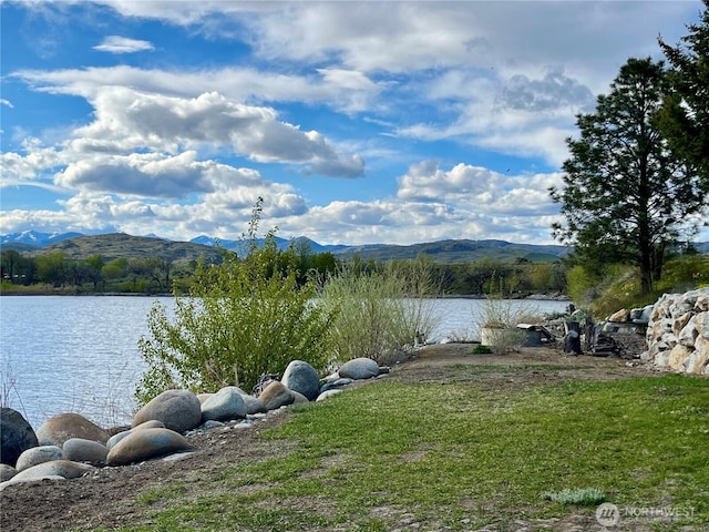property view of water featuring a mountain view