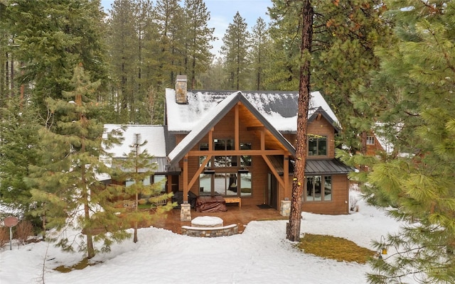 view of snow covered property