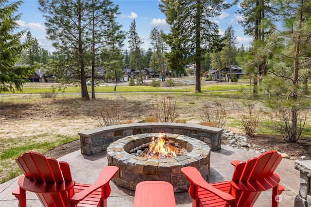 view of patio featuring a fire pit