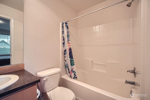 full bathroom featuring vanity, toilet, and shower / bath combo with shower curtain