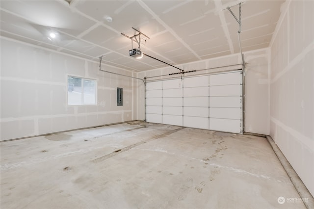 garage with electric panel and a garage door opener