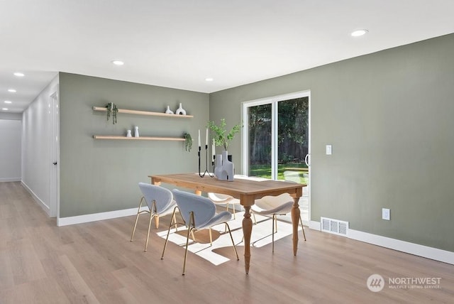 dining room featuring light hardwood / wood-style flooring