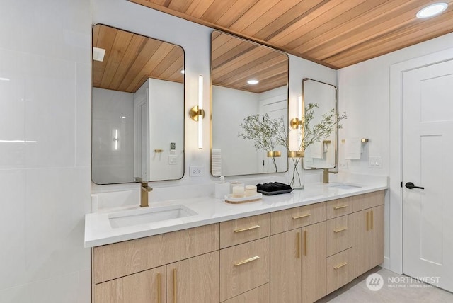 bathroom with vanity and wooden ceiling