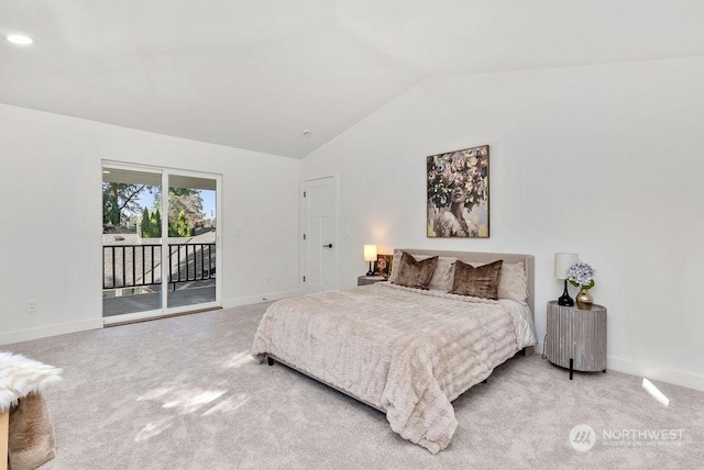 bedroom with access to exterior, carpet floors, and vaulted ceiling